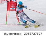 Small photo of Russian Federation Alpine Skiing Championship, parallel slalom. Mountain skier Veronika Gavrish Murmansk Region skiing down mount slope. Moroznaya Mount, Kamchatka Peninsula, Russia - March 30, 2019
