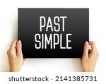 Small photo of Past simple - basic form of the past tense in Modern English, text on card concept background