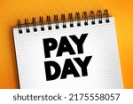 Pay Day text on notepad, concept background