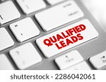 Small photo of Qualified Leads - potential customers in the future, based on certain fixed criteria of your business requirements, text concept button on keyboard