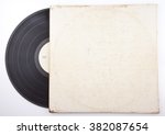 Old vinyl record in a paper case