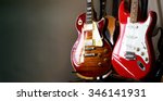 Electric Guitars Resting On A...