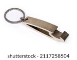 Small photo of Metal bottle opener in the form of a keychain with attached steel split ring close-up on a white background