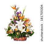 Small photo of Close up lily - rose - berry - alstroemeria troika - iris - bird of paradise - caspia flower bouquet in wicker basket isolated on white