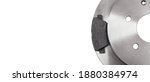Small photo of set of brake pad with rotor brake disc new spare parts brake shoe for a car isolated on a white background top view horizontal banner with copy space, nobody.