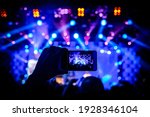 Man takes a picture of the show ...