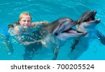 Happy Child And Dolphins In...