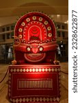 Small photo of TRIVANDRUM, INDIA - SEPTEMBER 07, 2022: Model of Theyyam artist perform during temple festival in Kerala India. Theyyam is a popular ritual form of worship in Kerala India