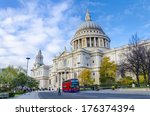 St. pauls cathedral with red double decker bus in London, United Kingdom