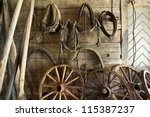 Old Tools And Wheels In A Barn