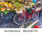 Fruit market with old bike in Campo di Fiori, Rome