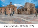 Small photo of VALENCIA, SPAIN - MARCH 29, 2022: Square Verge, or Square Mare Deu, with Basilica de la Mare de Deu dels Desemparats and Passatge d'Emili Aparicio Olmos, near Catedral de Valencia.