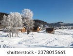 View of the winter Altai, the village of Artybash on the Bank of the Biya river. Altai Republic, Russia