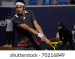 Small photo of Santiago - JANUARY 31: Paul Capdeville using his backhand during the match against Potito Starace, during the first round of the ATP tournament of Santiago, January 31 2011 in Santiago, Chile.