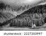 ranui church in south tyrol funes valley dolomites italy view in bw
