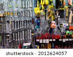 Various repair tools for sale on hardware store showcase .