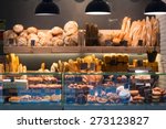 Modern bakery with different kinds of bread, cakes and buns  