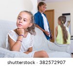 Small photo of Offended little girl is jealous sister of teenage stepbrother