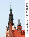 Small photo of Elblag, Poland - May 9, 2019: Spire of St. Nicholas Cathedral in the Old Town of Elblag, which was destroyed during WWII and is being restored since 1989 till now.