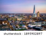 Small photo of Evening Picture of the Thames Separating City of London and Tower Hamlets from Southwark, with Tower Bridge at a Distance