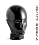 Small photo of Still Life of Shiny Black Featureless Mannequin Face Statue Against White Background in Studio