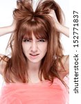 Small photo of Girl portrait of angry and shoot the breeze at his hair