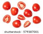 Falling plum tomatoes isolated on white background. Top view