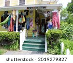 Small photo of Woodstock, New York - June, 2021: Downtown shops along the main drag in charming town of Woodstock, most known for its artists, musicians, actors, and writers, as well as music festivals.
