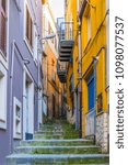 Small photo of View of a narrow street in Enna, Sicily, Italy