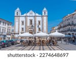 Small photo of Evora, Portugal, June 15, 2021: People are enjoying a suny day at Praca do Giraldo square in Evora, Portugal.