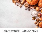 Small photo of Autumn fall baking background with pumpkins, apples, nuts, food ingredients and seasonal spices on white, top view, copy space. Cooking pumpkin or apple pie for Thanksgiving and autumn holidays.