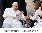 Small photo of Saint Peter's Square, Vatican City - 27th October 2023 - Pope Francis blesses religious items from the hands of newlyweds