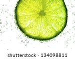 Lime Slice In Water Bubbles