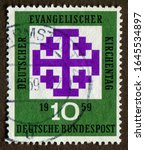 Small photo of Germany stamp circa 1959: a stamp printed in Germany Shows Synod Emblem, Meeting of German Protestants (Evangelical Synod), Munich, Aug. 12-16.