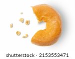 Missing piece of plain donut with crumbs on white background.