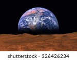 Imaginary view of earth rising from the horizon of plant Mars. Elements of this image are furnished by NASA