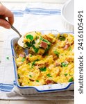 Small photo of ham AND SPINACH BREAD BAKE STRATA.style rustic.selective focus