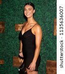 Small photo of MIAMI, FL - JULY 15: Brenna Huckaby attends the 2018 Sports Illustrated Swimsuit show at PARAISO during Miami Swim Week at The W Hotel South Beach