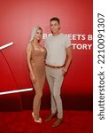 Small photo of Los Angeles, USA. 28th Sep, 2022, Lala Kent and Logan Noh arrive at Universal BROS premiere held at The Regal LA Live