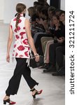 Small photo of New York, NY - September 16, 2015: Aubree Rivera walks the runway at the Proenza Schouler fashion show during the Spring Summer 2016 New York Fashion Week