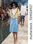 Small photo of NEW YORK, NY - SEPTEMBER12, 2016: Tarah Rodgers walks the runway at the Thom Browne Spring Summer 2017 fashion show during New York Fashion Week