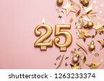 number 25 gold celebration... | Shutterstock . vector #1263233374