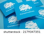 Small photo of LONDON, UK - July 2022: Conservative United Kingdom political party logo against a blue background