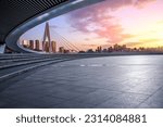 Empty city square and skyline with modern architecture in Chongqing, China.