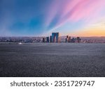 Small photo of Asphalt road and city skyline with modern building at sunset in Suzhou, Jiangsu Province, China. High Angle view.
