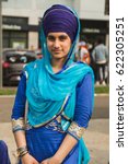 Small photo of BRESCIA, ITALY - APRIL 15, 2017: Sikh woman takes part in the annual Vaisakhi parade to celebrate the first harvesting of the year and the creation of Khalsa.