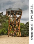 Small photo of Kootwijkerzand, Veluwe, Kootwijk, Province of Gelderland, The Netherlands, May 7, 2019: De Zandloper, Corten steel structure with function watchtower