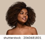 Beautiful african woman black t-shirt portrait afro haircut Color background. Brown