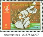 Small photo of Equatorial Guinea - circa 1978 : Cancelled postage stamp printed by Equatorial Guinea, that shows Judo, Summer Olympic Games 1980 - Moscow, circa 1978.