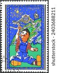 Small photo of North Korea - circa 1979 : Cancelled postage stamp printed by North Korea, that shows Boy with model spaceman, International Year of the Child, circa 1979.